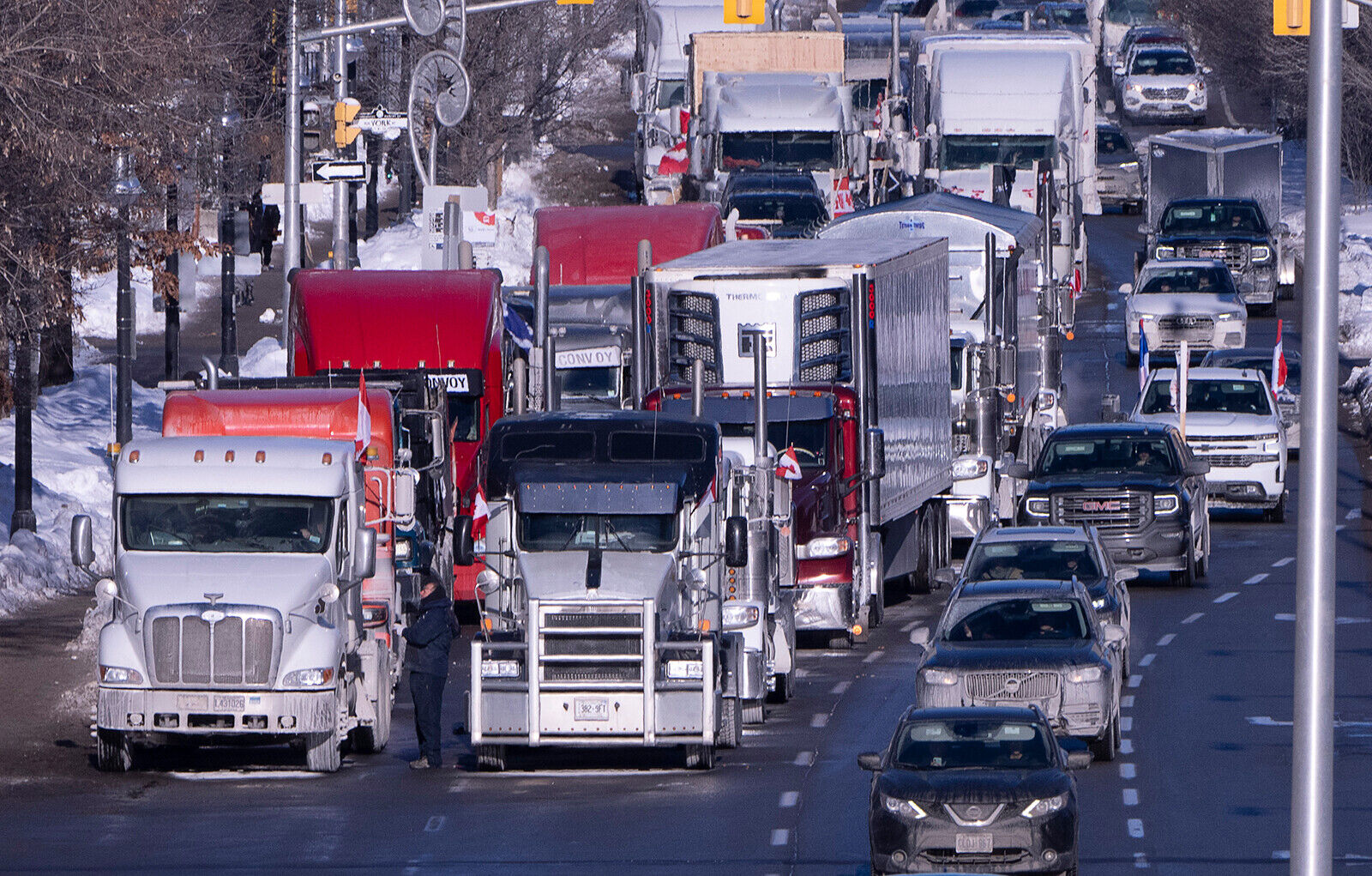 Truckers and protesters against Covid-19 mandates block a border crossing and flood Canada's capital. Trudeau responds with sharp words